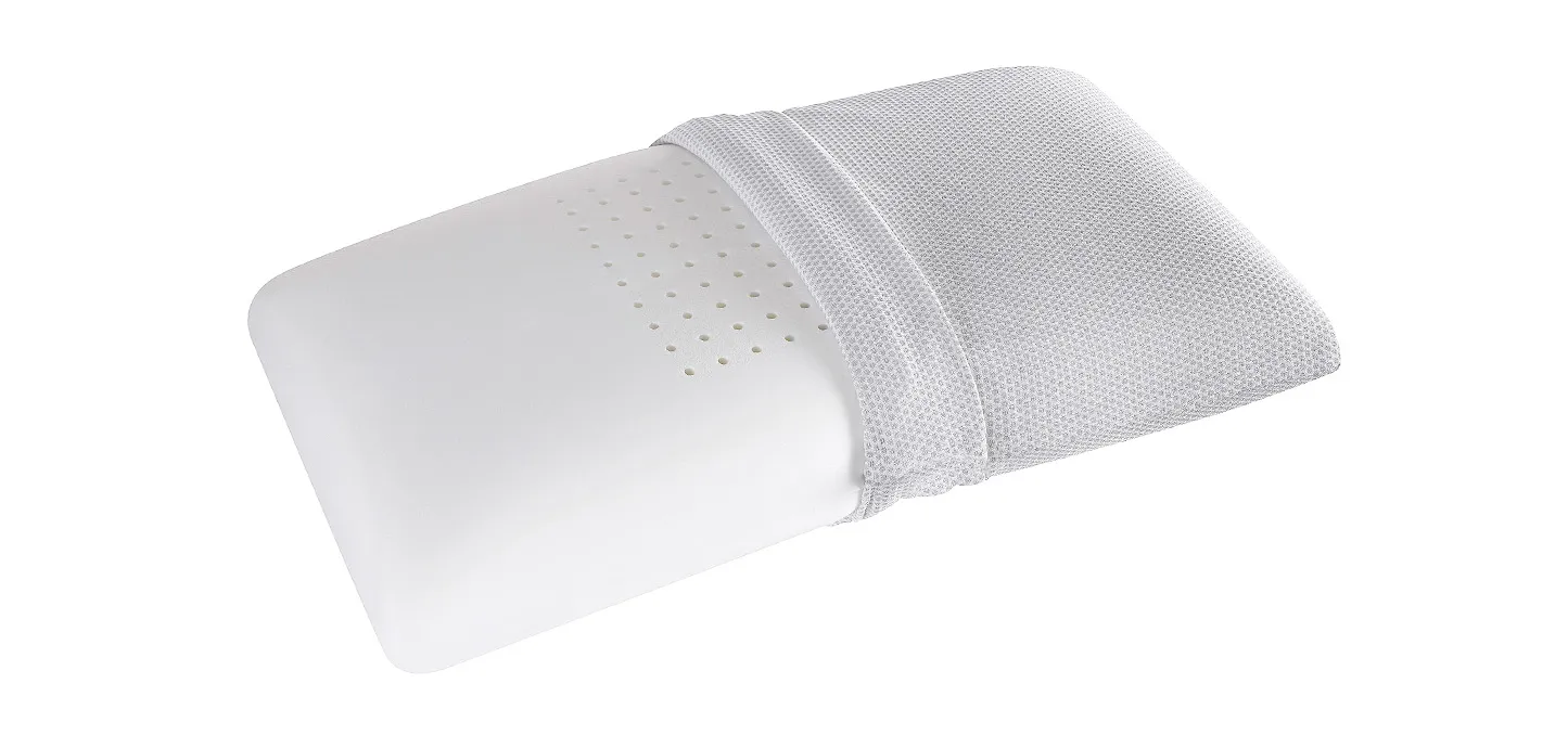 Guanciale MagniCool 3D Maxi Magniflex con la fodera aperta sulla lastra forata in Memoform