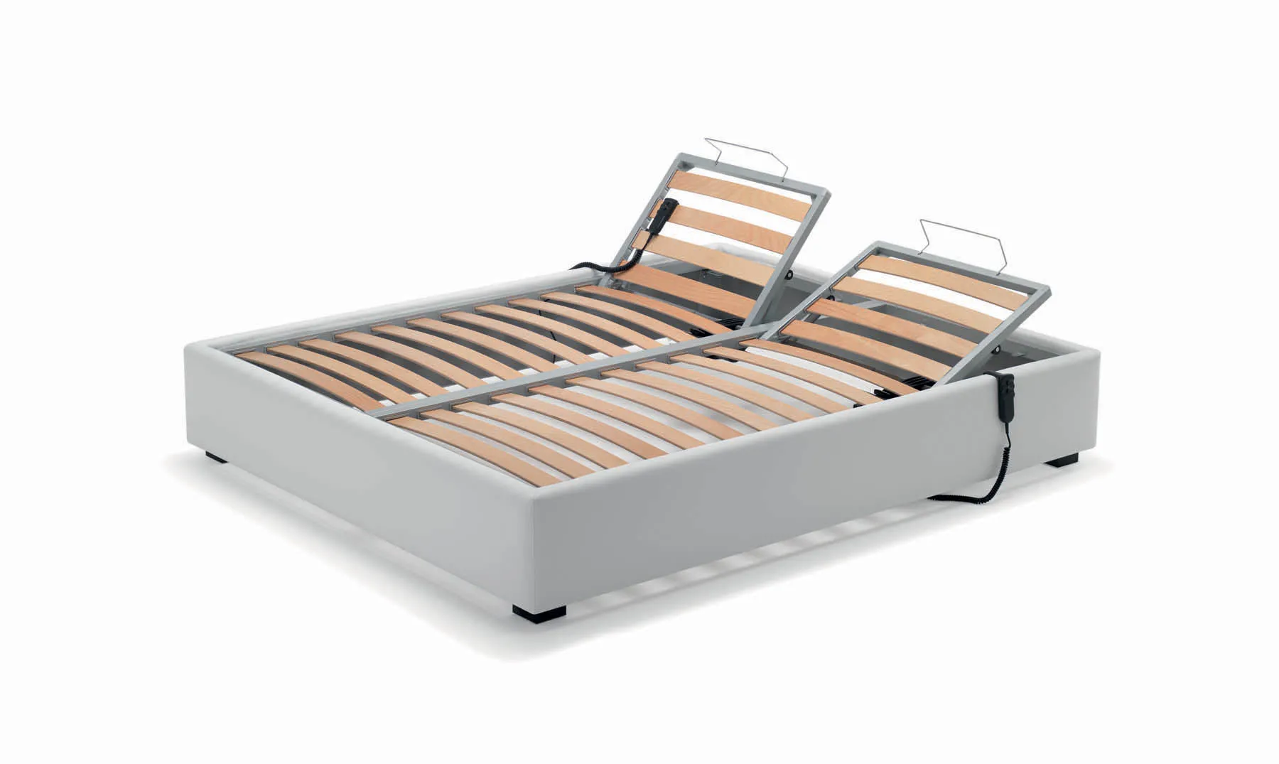 Rete Bed Samoa divisibile con zone testa sollevate, montata in un sommier bianco