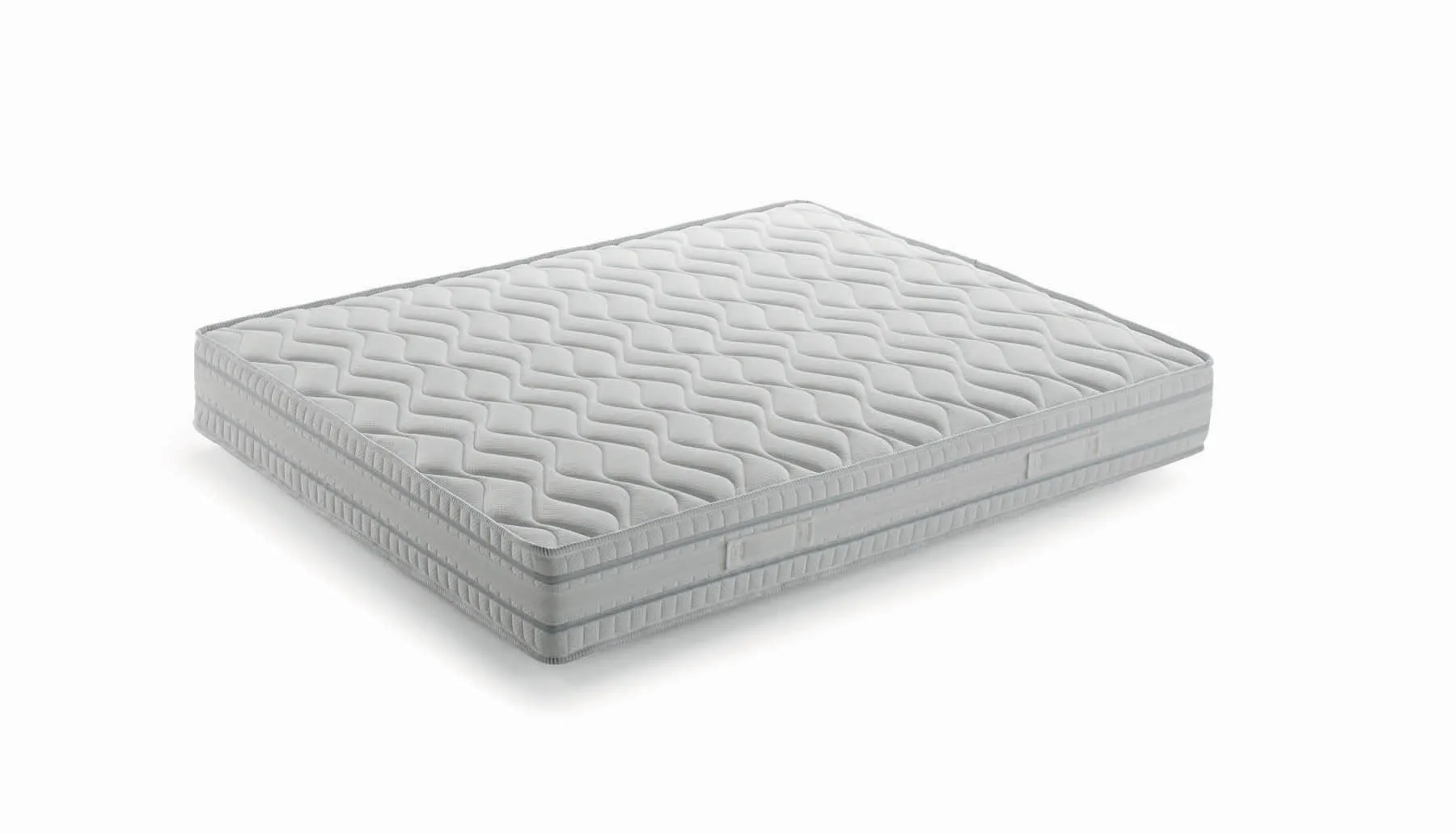 Materasso a molle Imperial Samoa con fodera Wellness trapuntata a onde, su fondo bianco