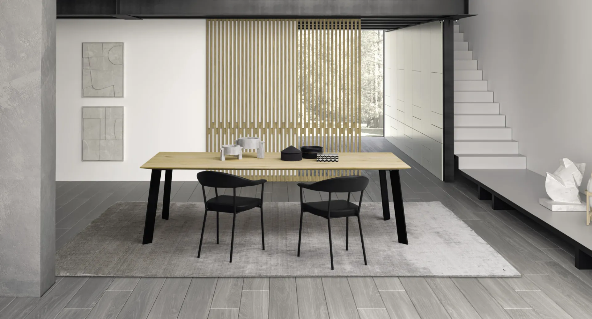Tavolo Manhattan Devina Nais in rovere chiaro su gambe nere in un open space