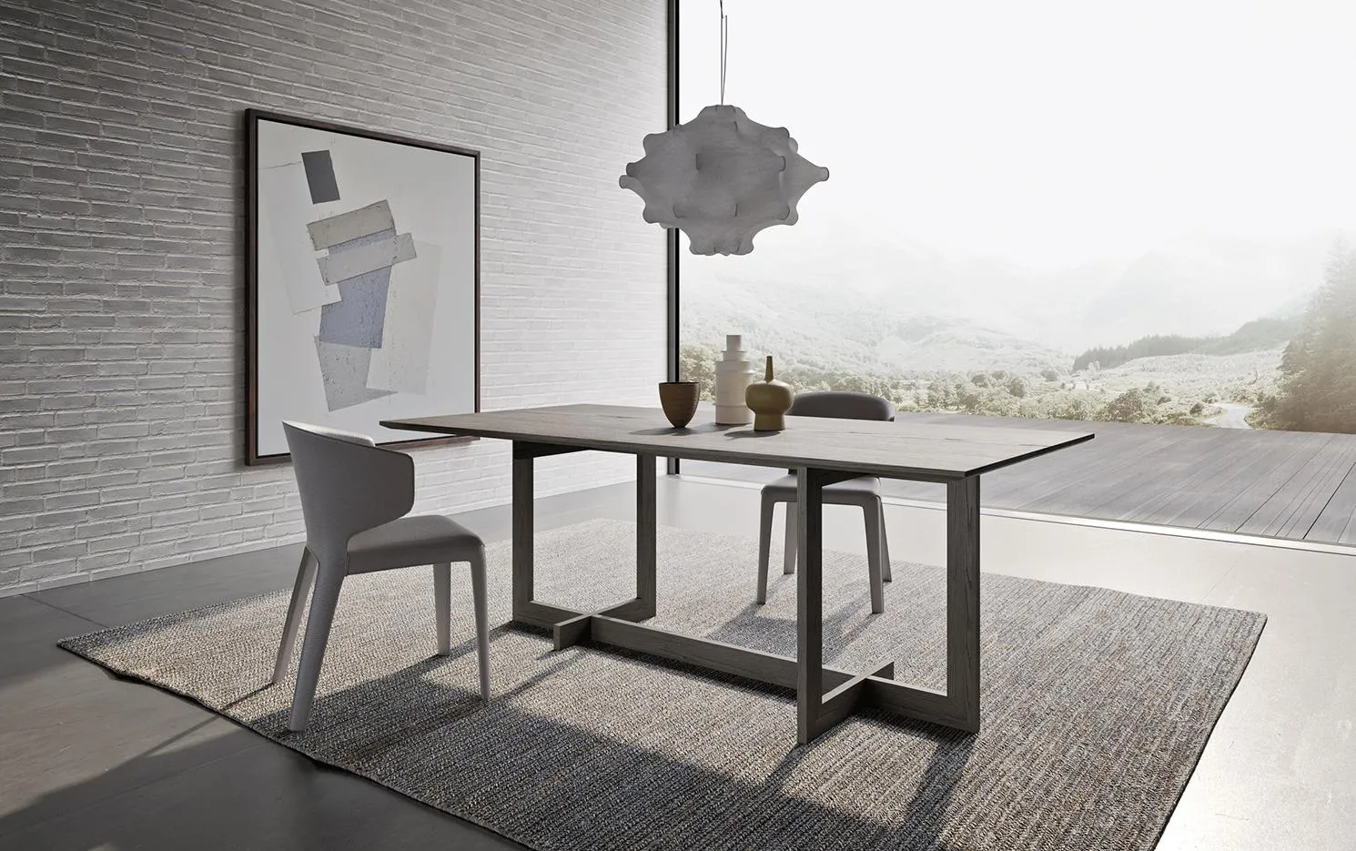 Tavolo Zen MobilGam con piano chiaro e sedie grigie