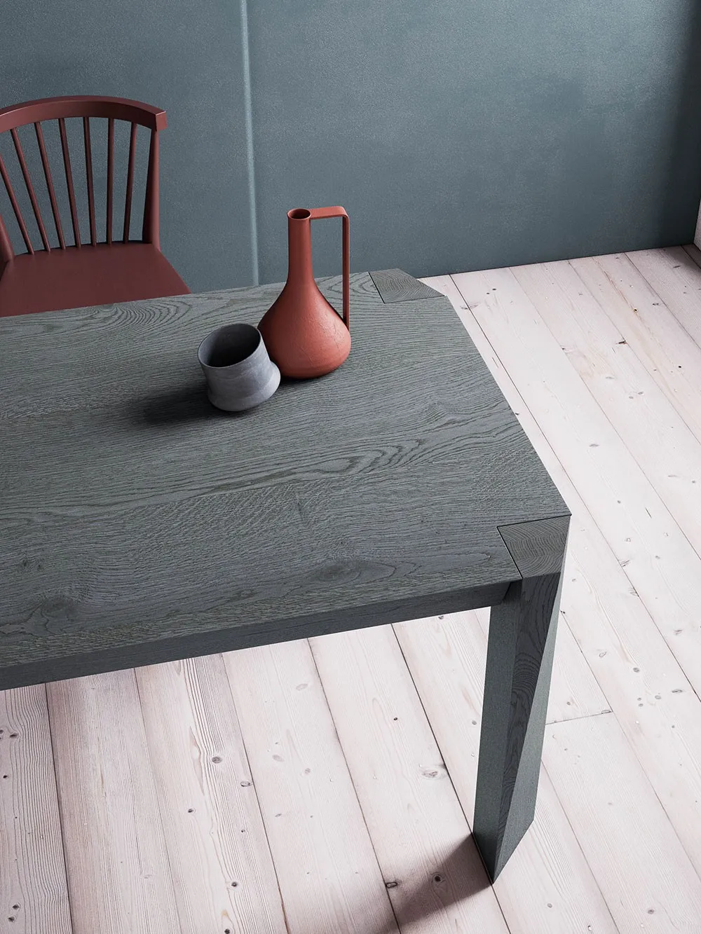 Angolo del tavolo Twist Pizzolato con piano grigio e vasi in ceramica