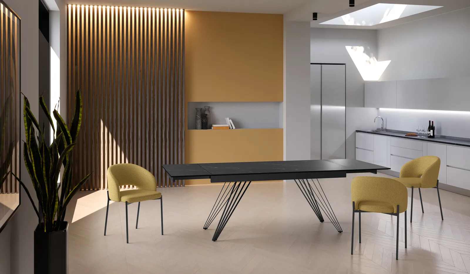 Tavolo Match 1 Stones marmo nero con sedie gialle in una cucina open space