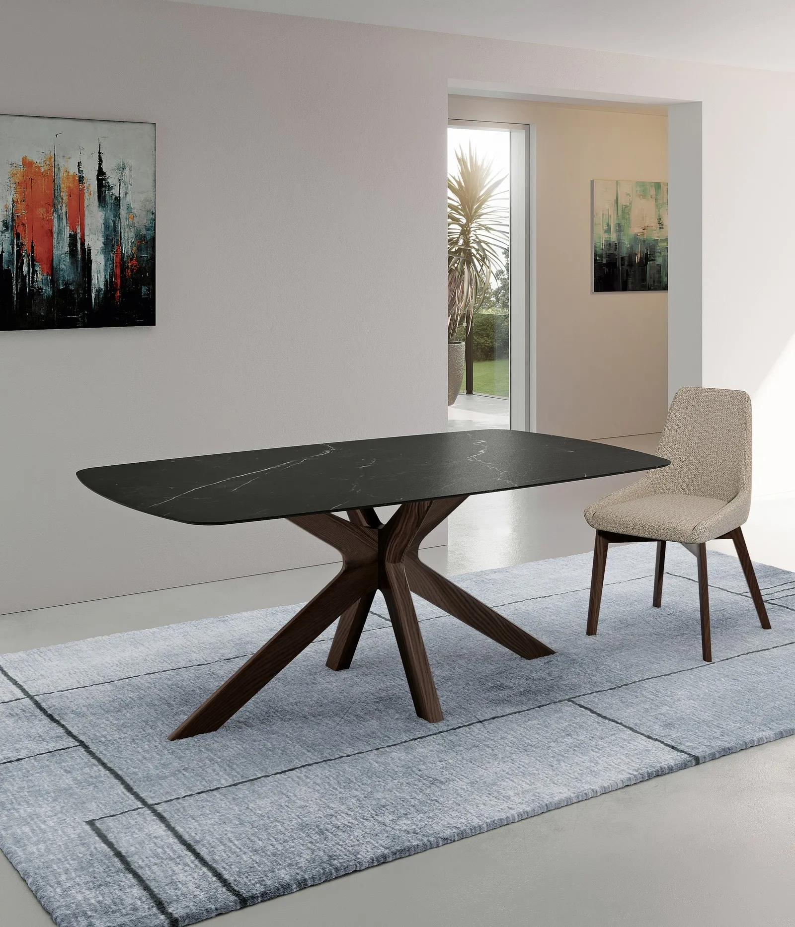 Tavolo Gemini Stones marmo nero con base in noce e sedie chiare