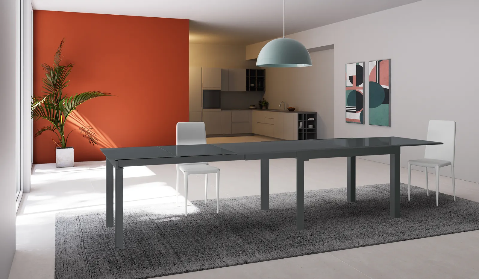Tavolo Executive Stones grigio allungato a 350 cm in un ambiente con parete rossa