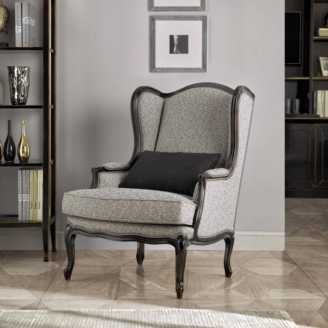Poltrona bergère Tosato 52.13 grigia a orecchioni con cornice nera e gambe a cabriolet