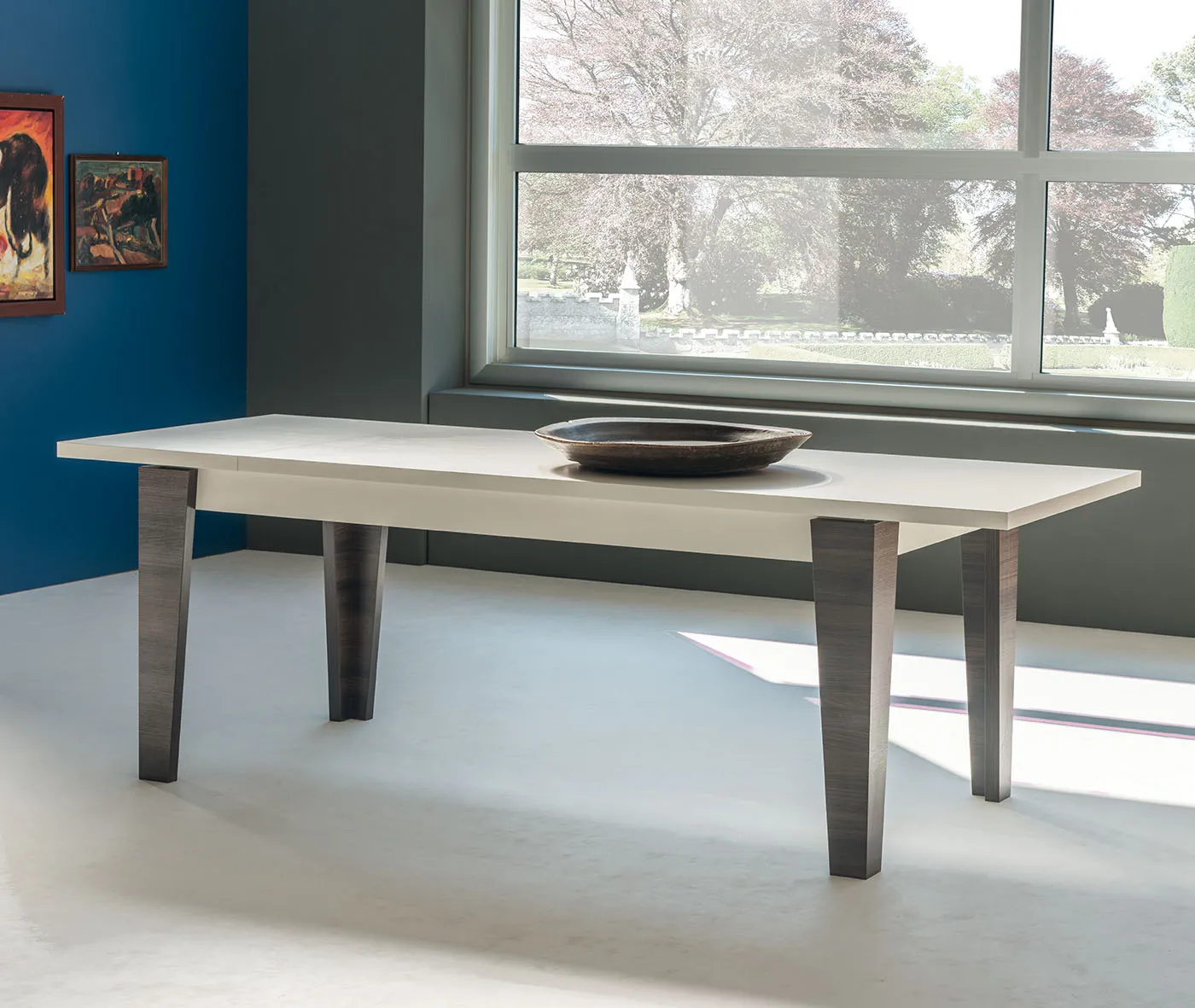 Tavolo allungabile Arlen Tecnolegno con piano chiaro e gambe squadrate grigie