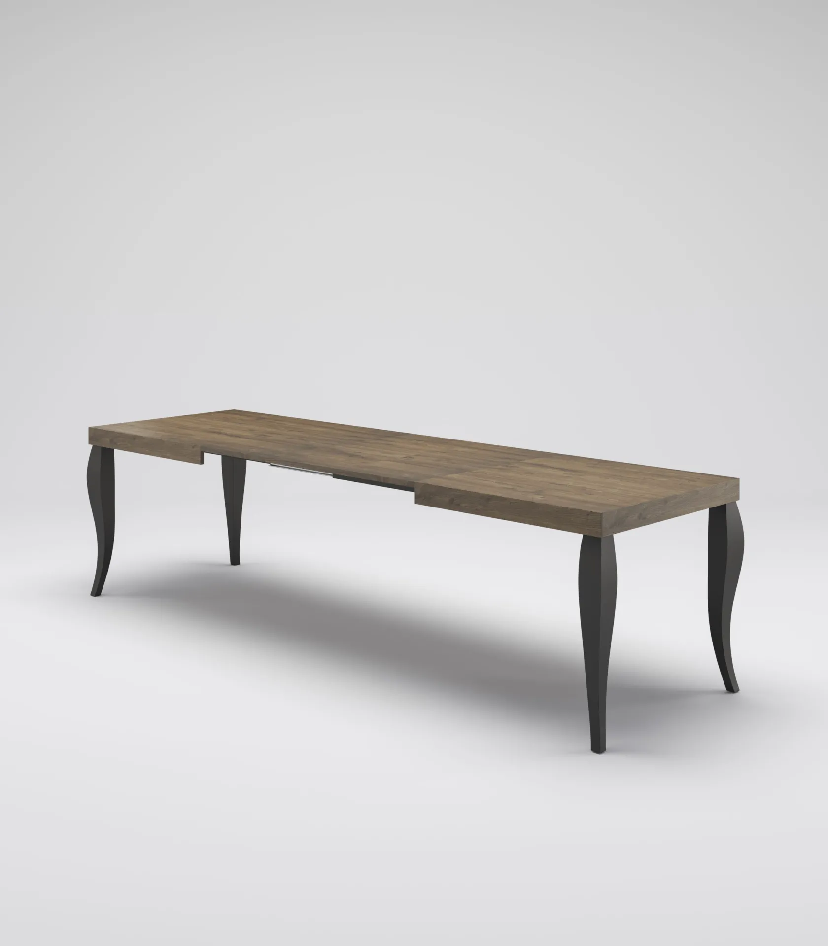 Tavolo allungabile Adelaide Tecnolegno con gambe nere opache e piano rovere su fondo neutro