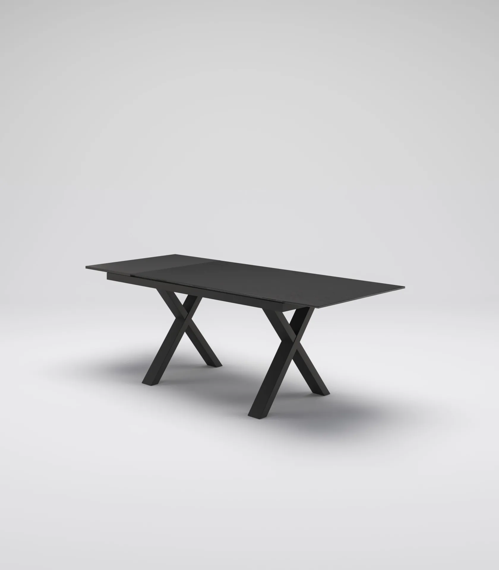 Tavolo Alba Tecnolegno aperto con piano in ceramica ardesia nero e gambe nere su fondo neutro
