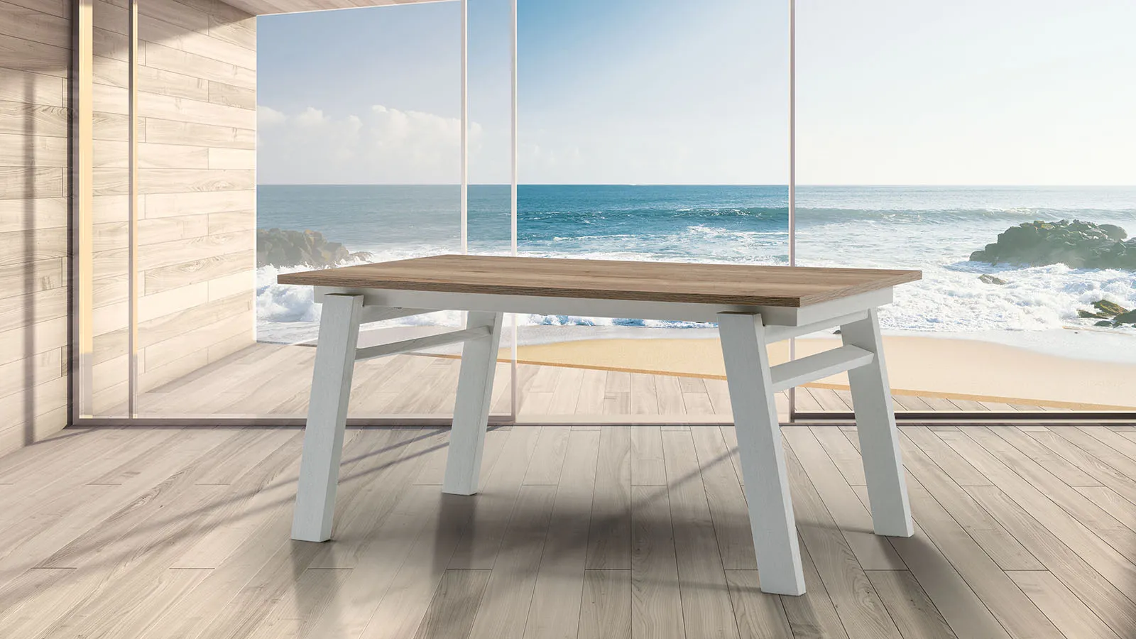 Tavolo Assen Tecnolegno con piano effetto legno e gambe bianche davanti a una vetrata sul mare