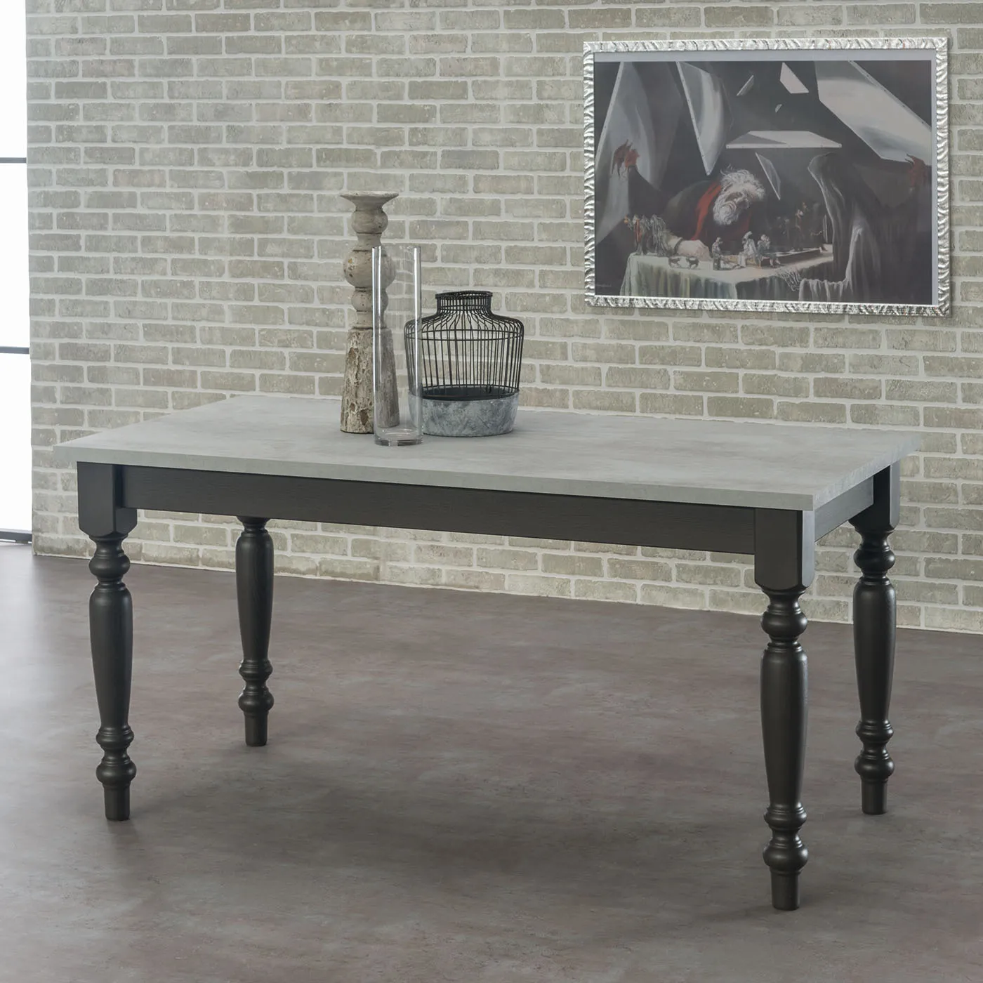Tavolo Caravaggio Tecnolegno con piano effetto cemento e gambe tornite nere