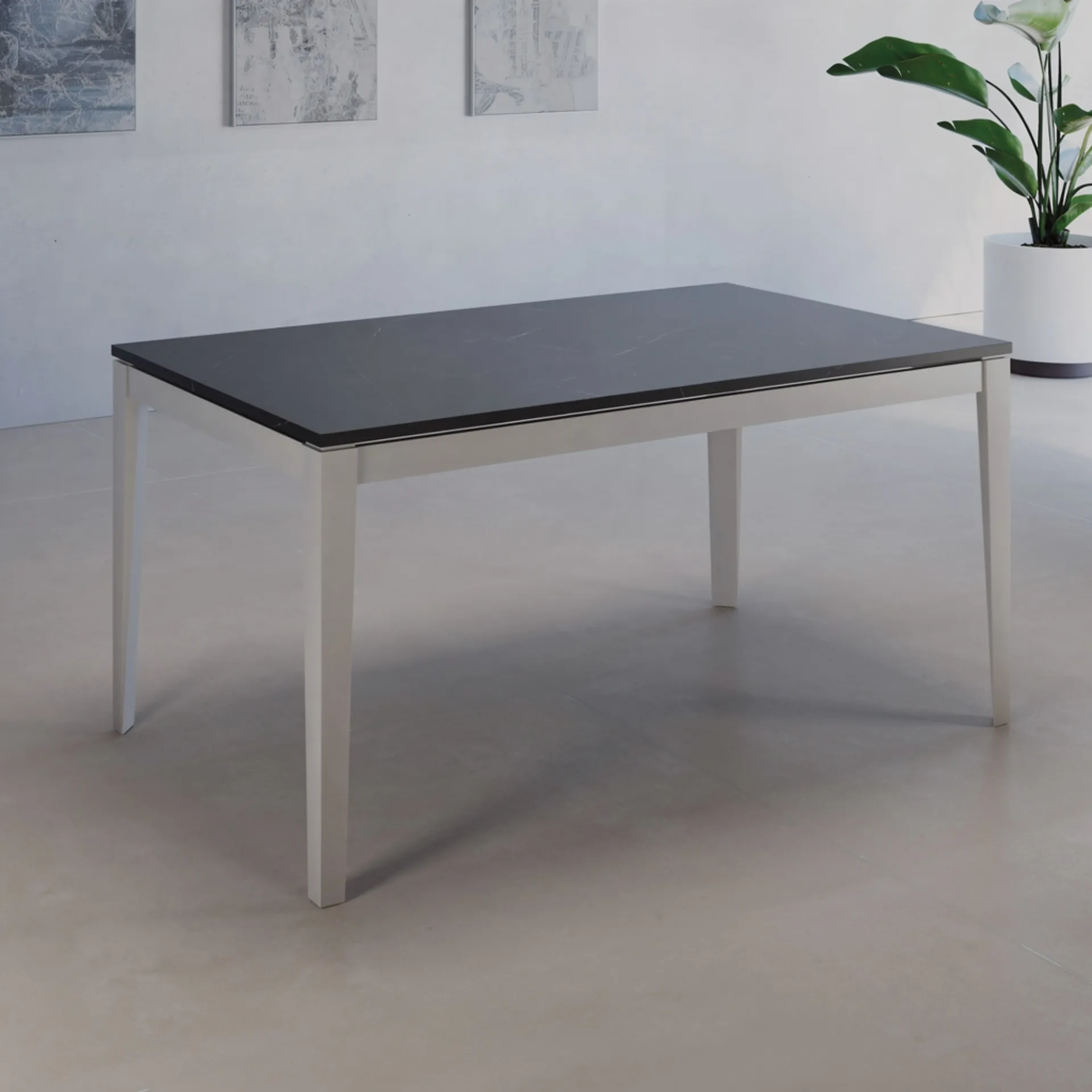 Tavolo allungabile Ginevra Tecnolegno con piano nero e gambe affusolate grigio chiaro