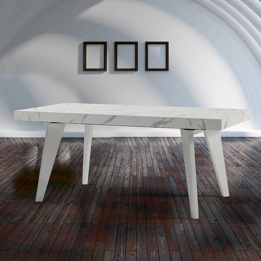 Tavolo Rotterdam Tecnolegno con piano effetto marmo in un ambiente ad archi bianchi