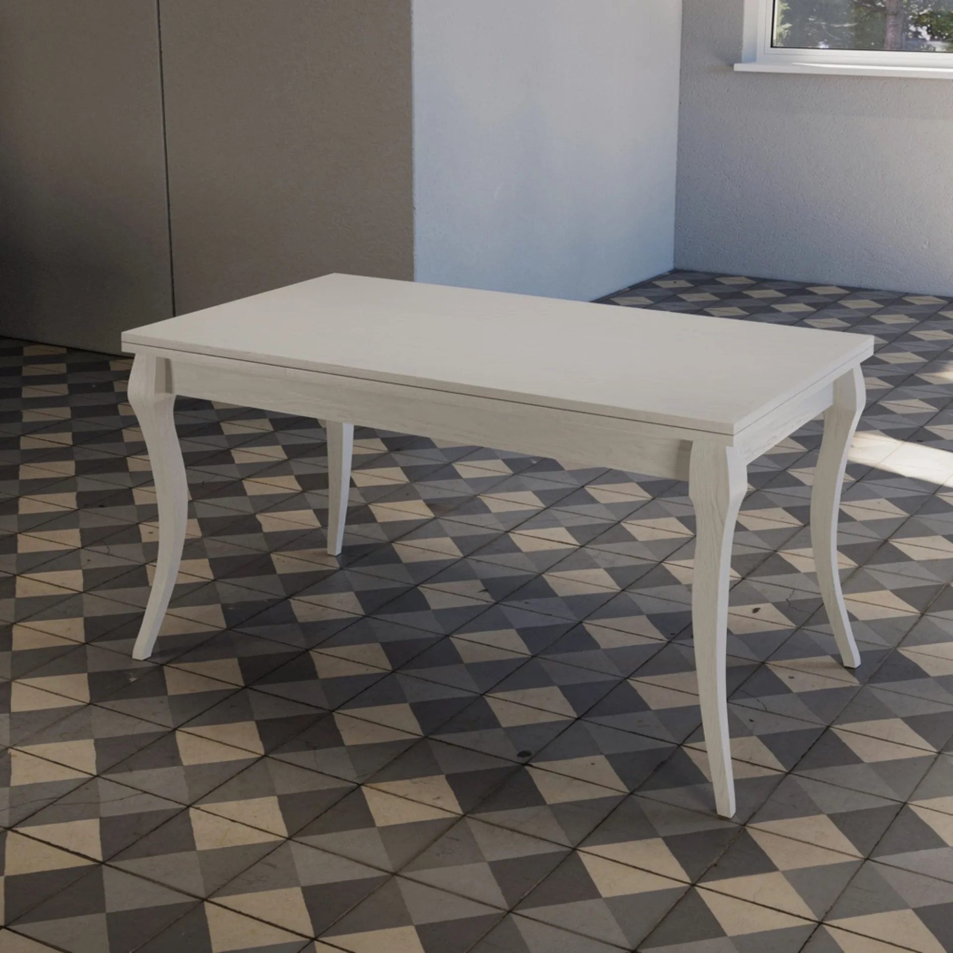 Tavolo allungabile Saronno Tecnolegno laccato bianco con gambe curve su pavimento a disegni