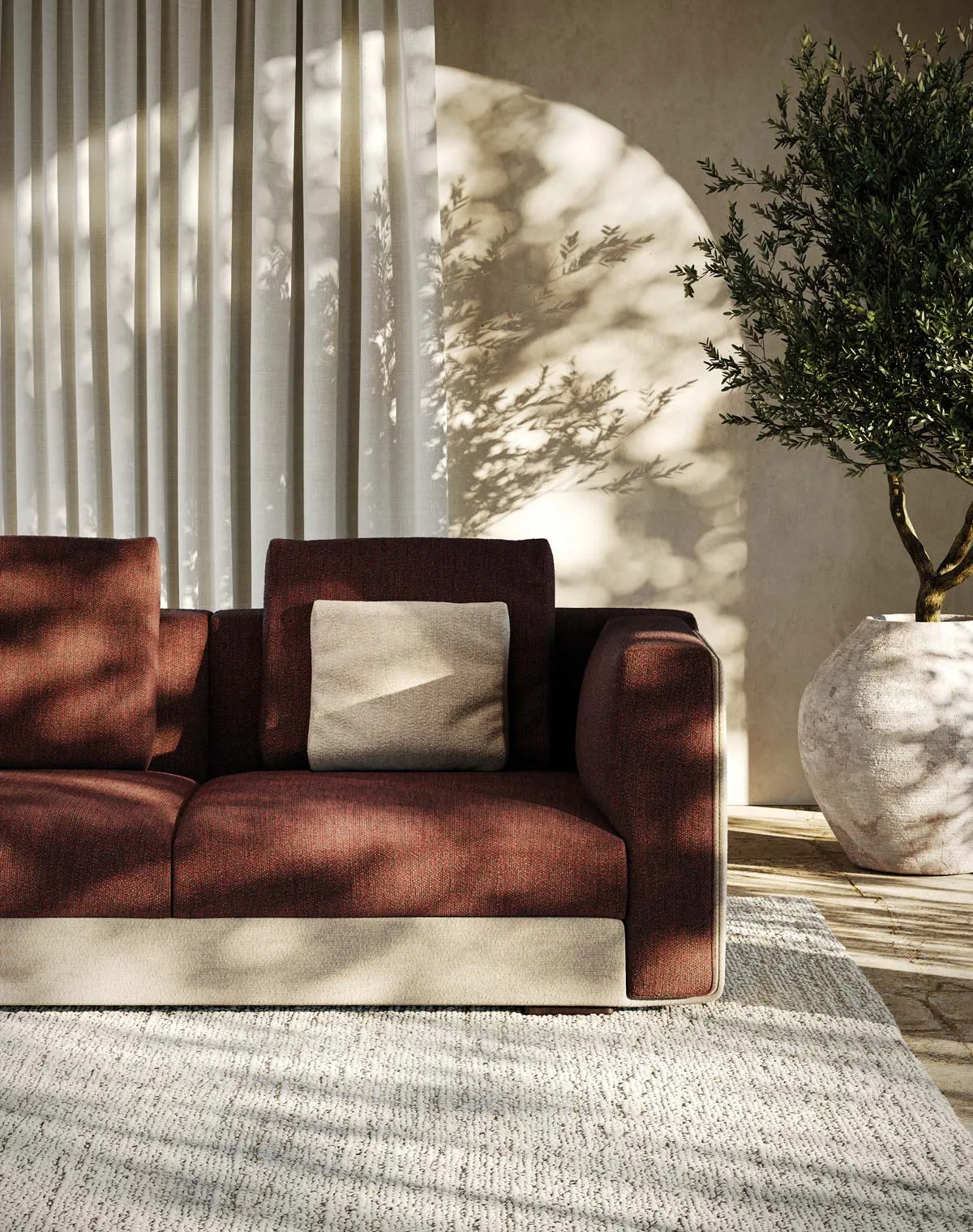 Poltrona Russell Frezza bordeaux con cuscino chiaro
