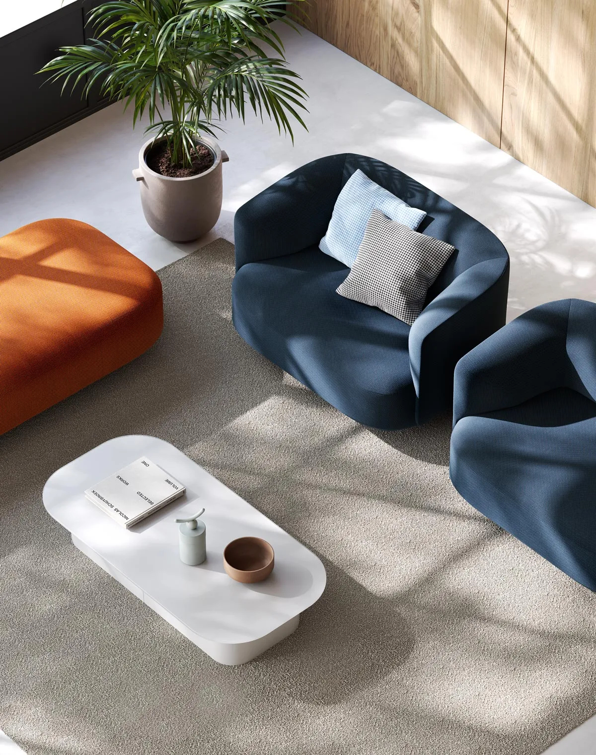 Tavolino da caffè Afina Frezza bianco tra poltrone blu