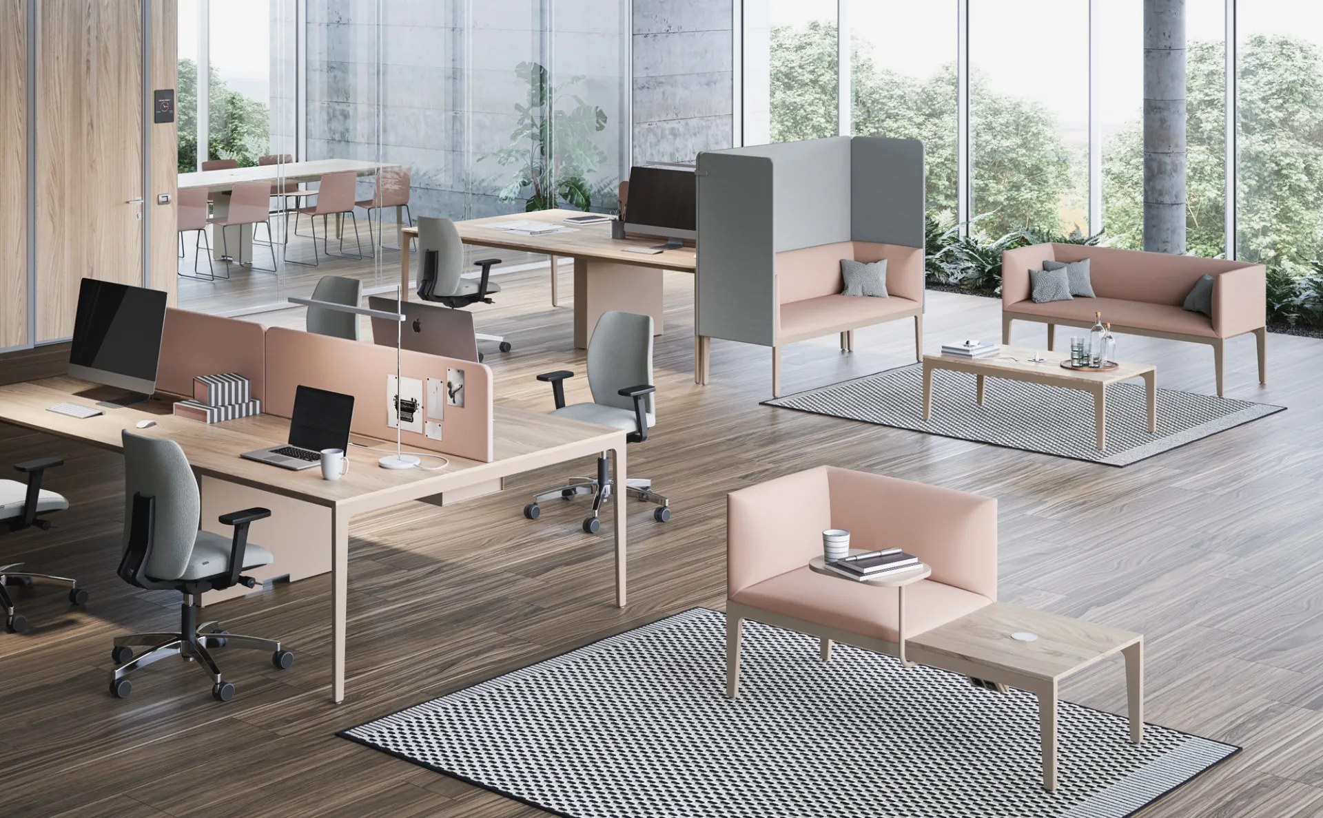 Postazioni bench Alplus Frezza con piani chiari in un ufficio con parquet e divanetti rosa