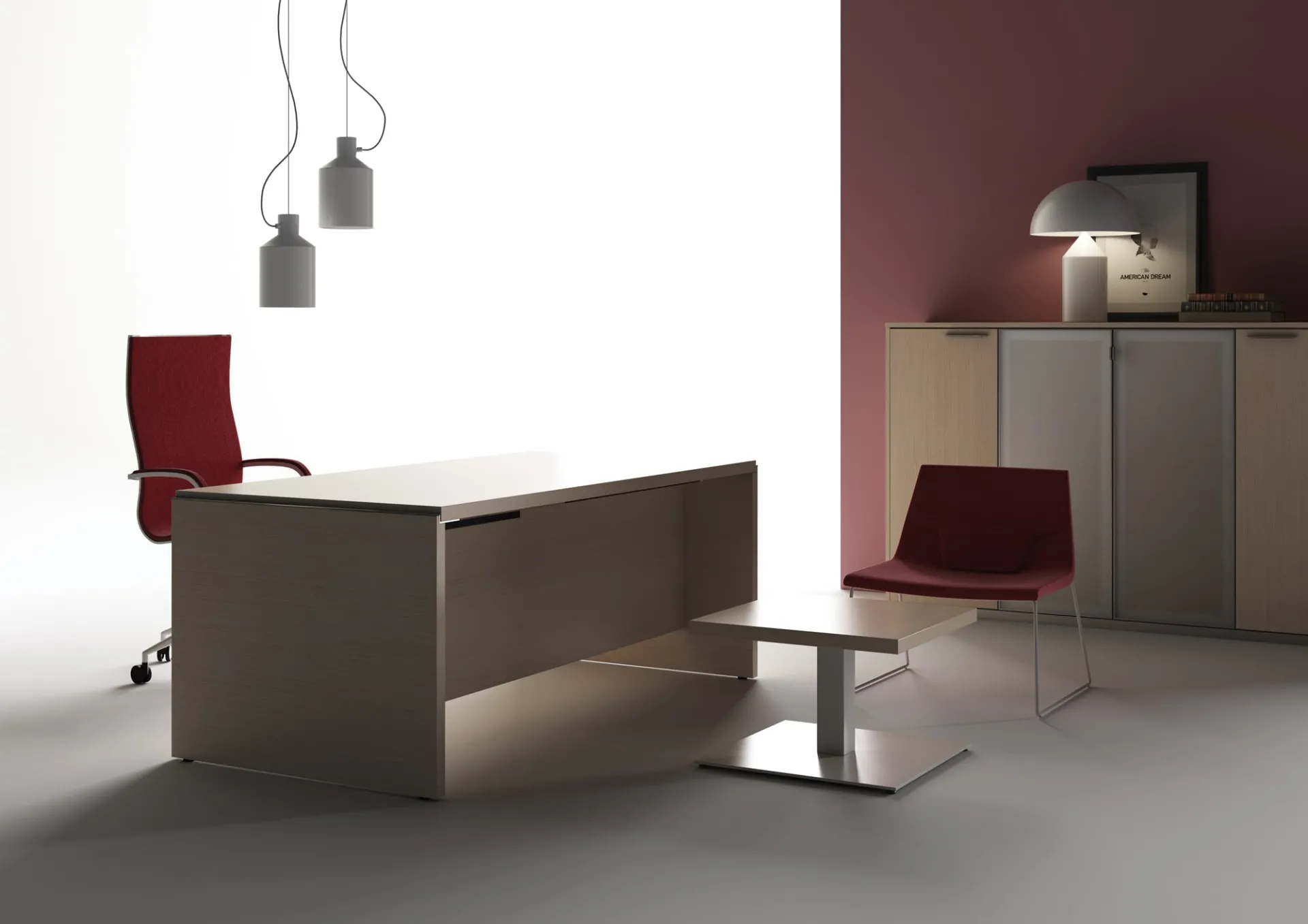 Scrivania direzionale Asset Frezza grigia con poltrona rossa e parete bordeaux