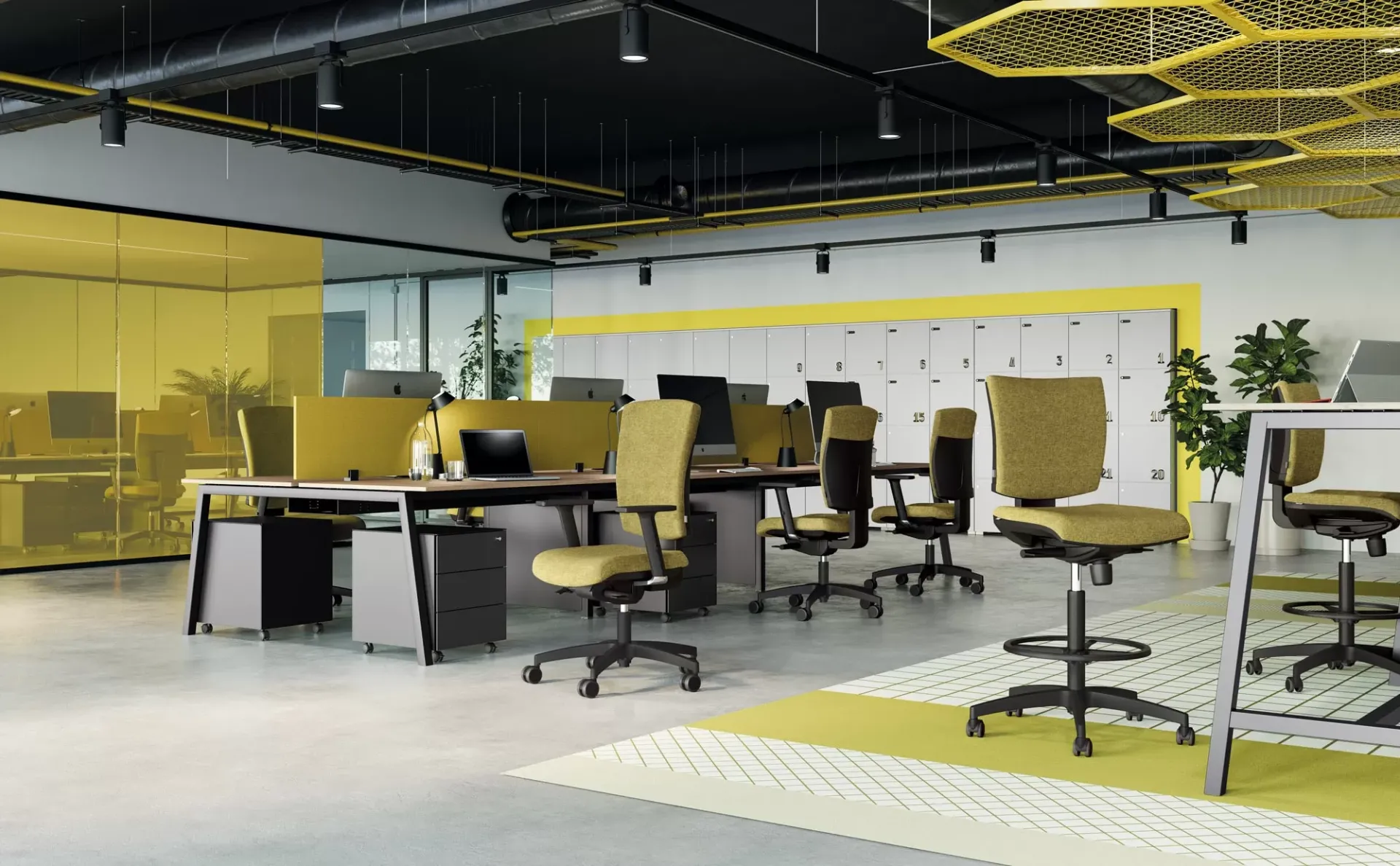 Sedie operative EM 59 Evo Frezza gialle in un open space con soffitto a nido d'ape