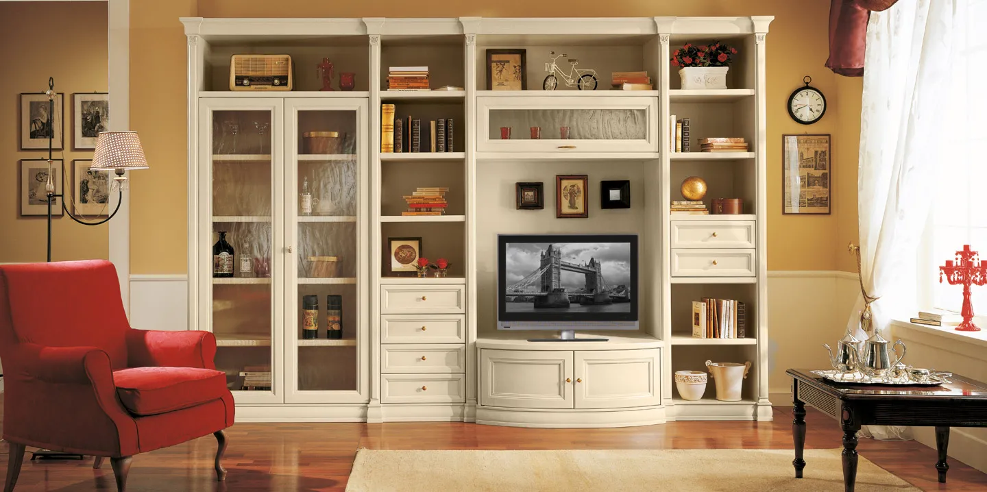 Libreria Charme Bernazzoli bianco anticato con vetrine, scaffali e vano tv, poltrona rossa