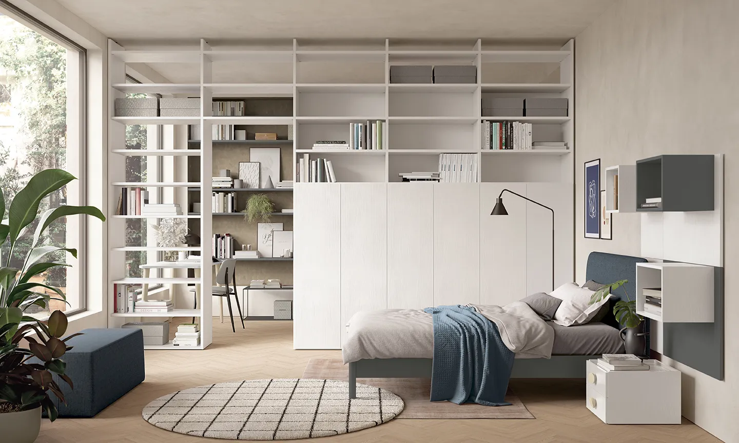 Camera ragazzi Golf Young's Space Colombini con libreria bianca e armadio basso che separano letto e studio