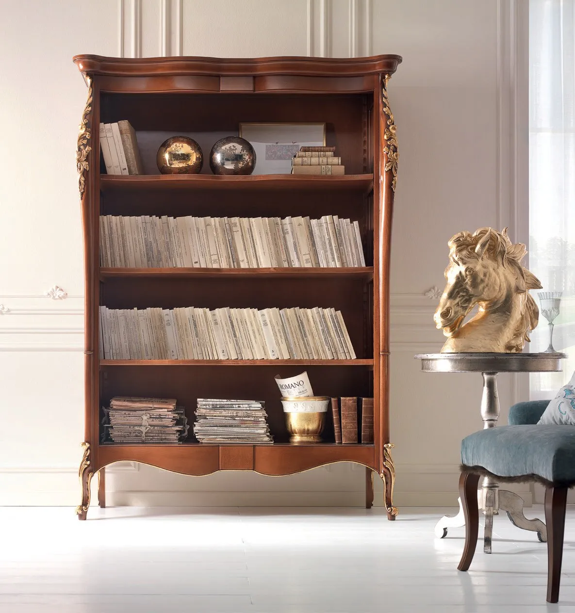 Libreria Venere Imba in noce con libri e base sagomata