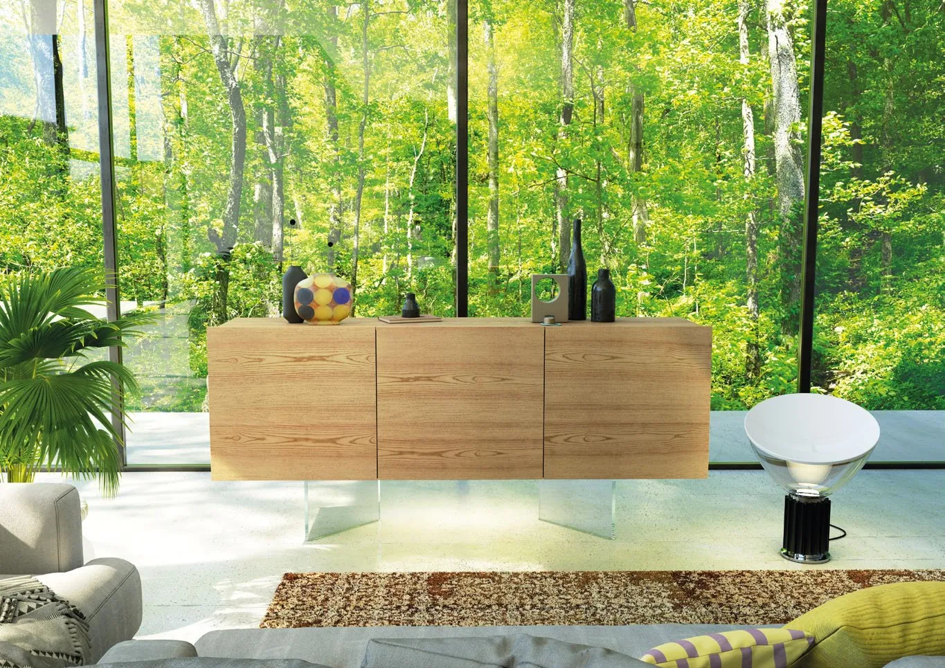 Credenza sospesa Nova Easy Imba in frassino chiaro davanti a una vetrata sul bosco
