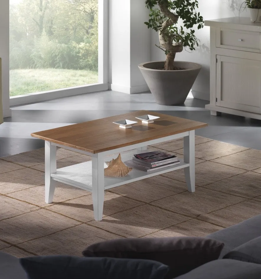Tavolino Maison Imba rettangolare bianco con piano in legno naturale davanti alla finestra