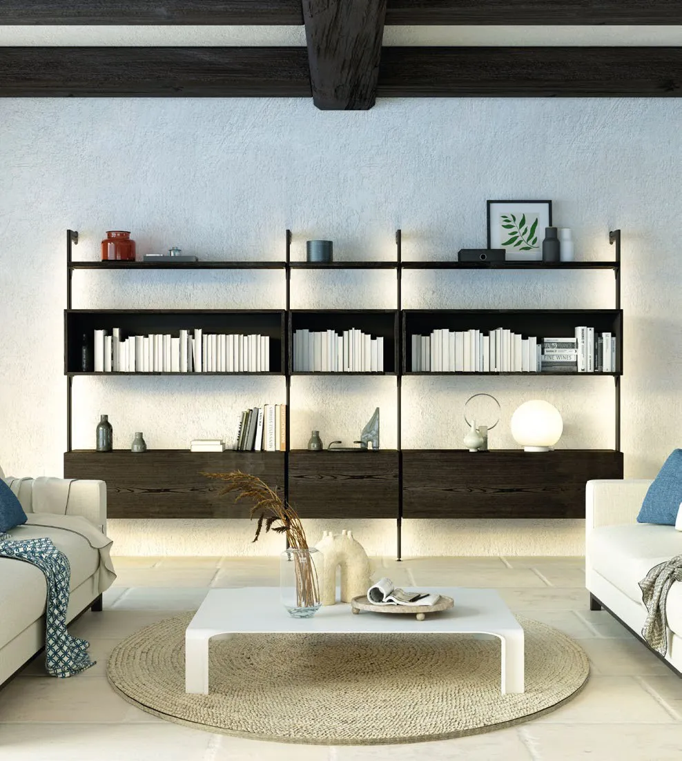 Libreria Nova 2 Imba in Testa di Moro dietro un divano bianco e un tavolino