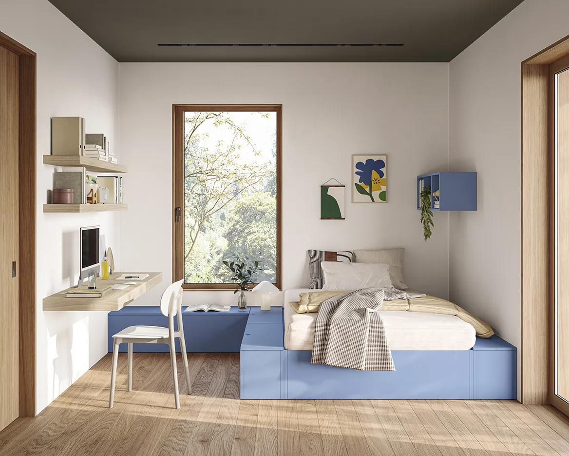 Camera ragazzi Golf Young's Space Colombini con letto su pedana azzurra contenitore e mensola scrittoio