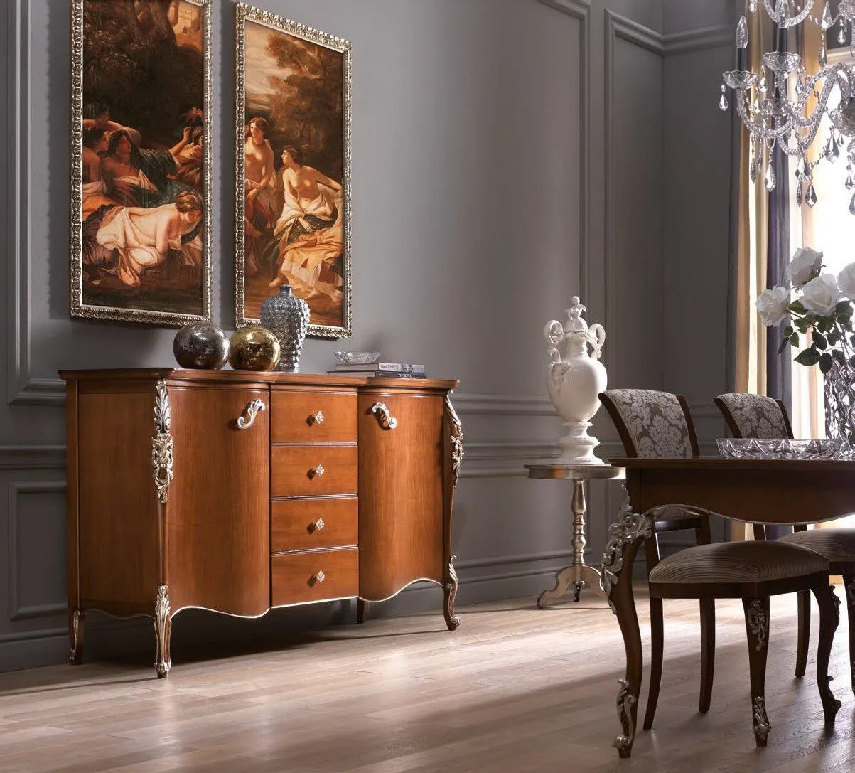 Credenza sagomata Trend Style Imba in noce con cassetti centrali sotto un grande dipinto