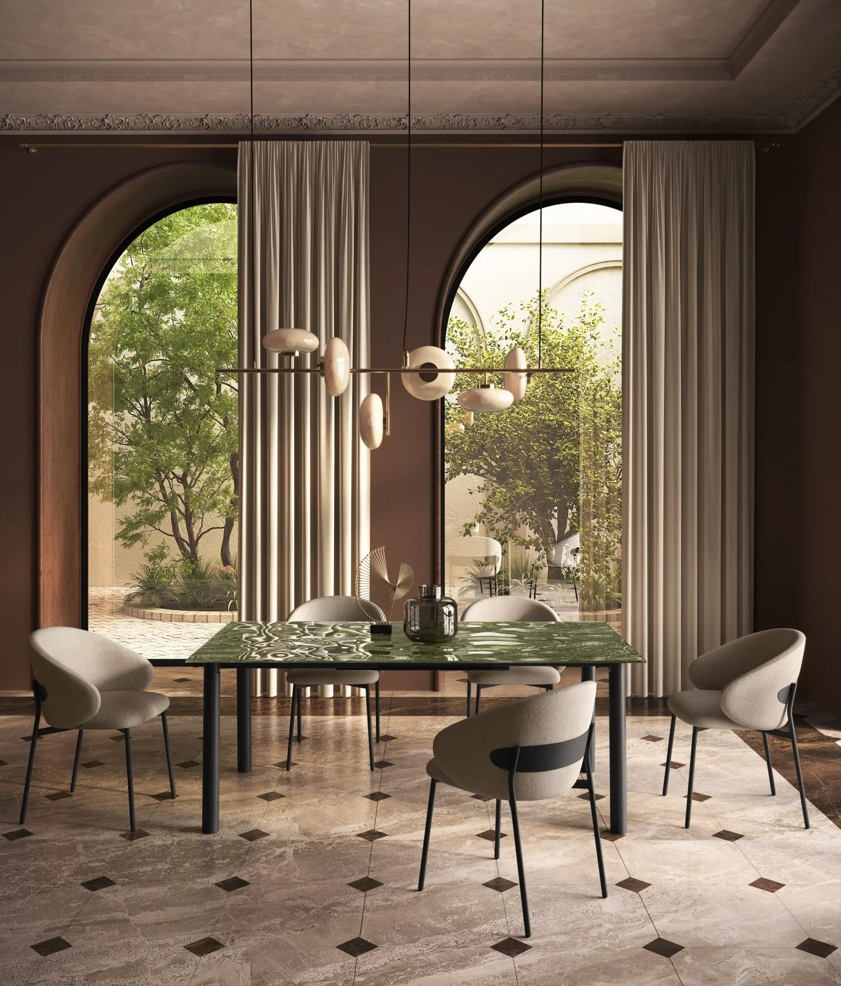 Tavolo Neptune Scavolini con piano in gres verde effetto marmo e poltroncine sotto le arcate