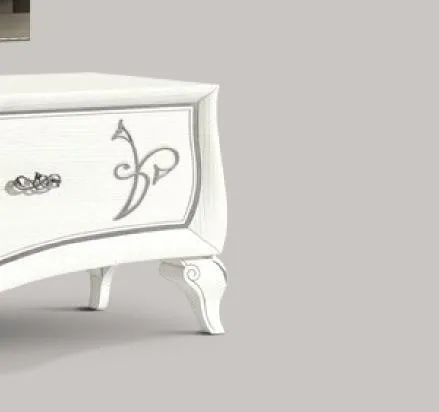 Dettaglio del cassetto decorato del porta TV Trend Style Imba con piedino sagomato