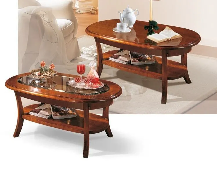 Due tavolini ovali Trend Style Imba in noce con ripiano inferiore in un salotto