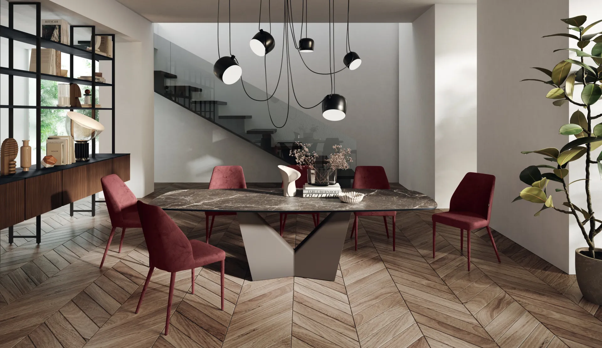Tavolo Sidney Scavolini con piano scuro venato e sedie bordeaux in una sala con scala