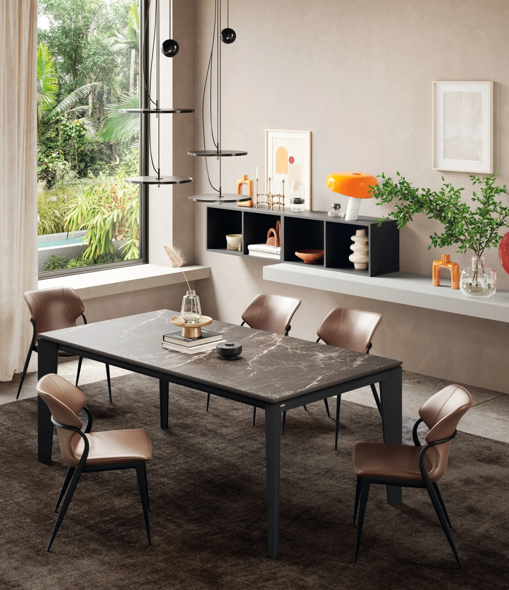 Tavolo Infinity Scavolini con piano scuro effetto marmo e sedie in cuoio viste dall'alto