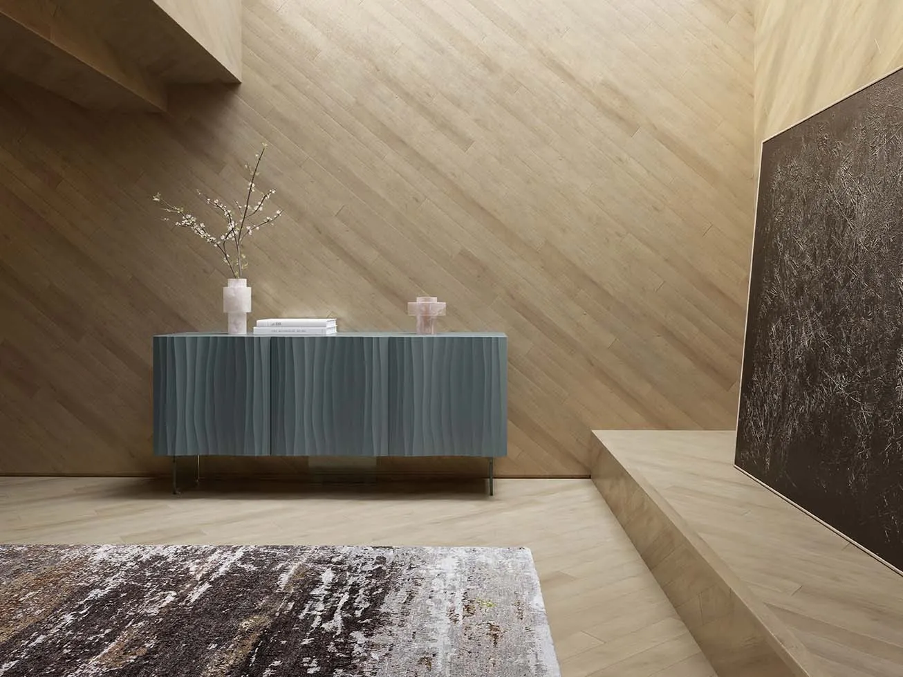 Madia Teti Target Point verde alga con ante ondulate su una parete con boiserie in legno