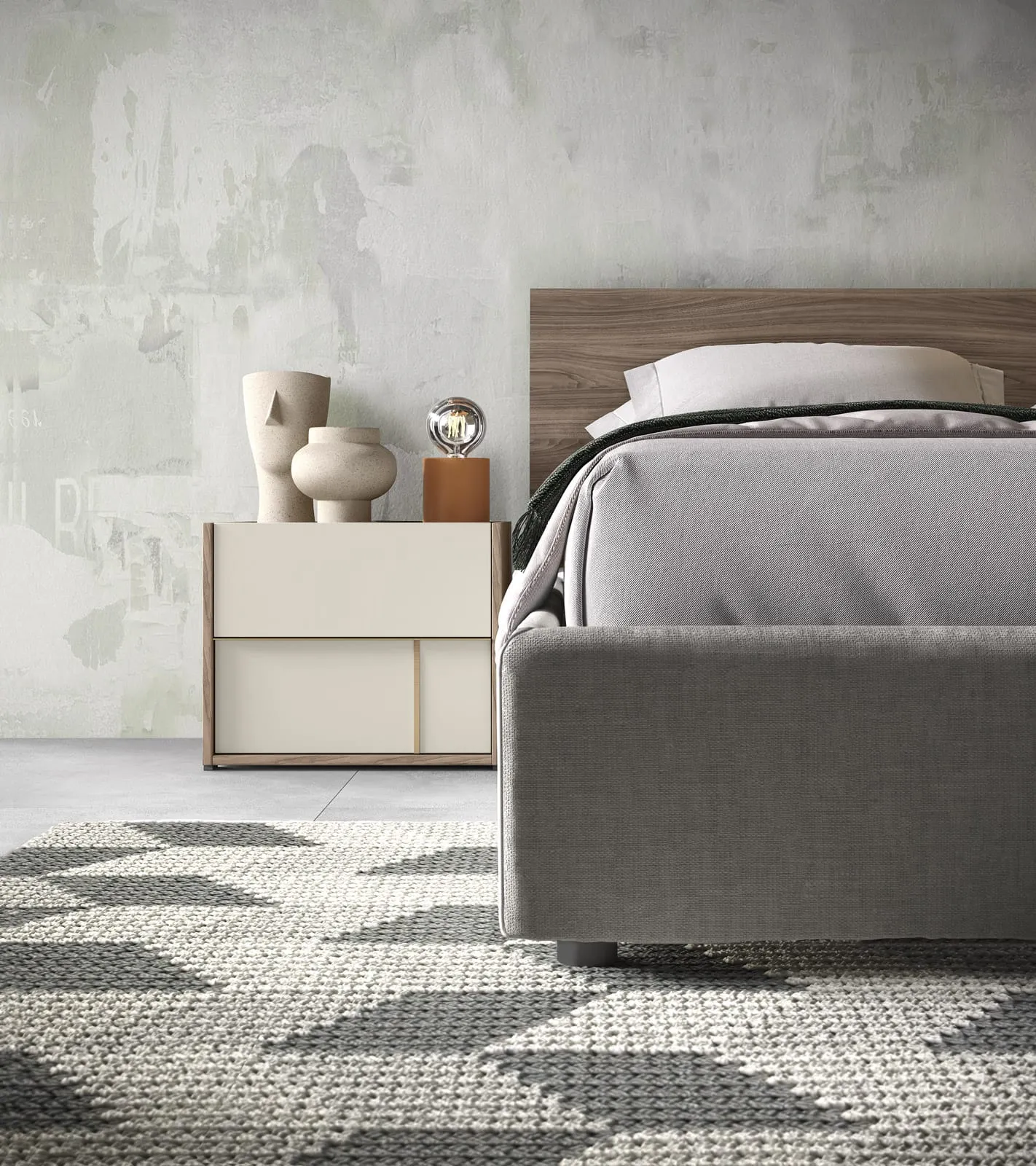 Comodino Kubo Adriatica accanto al letto imbottito grigio