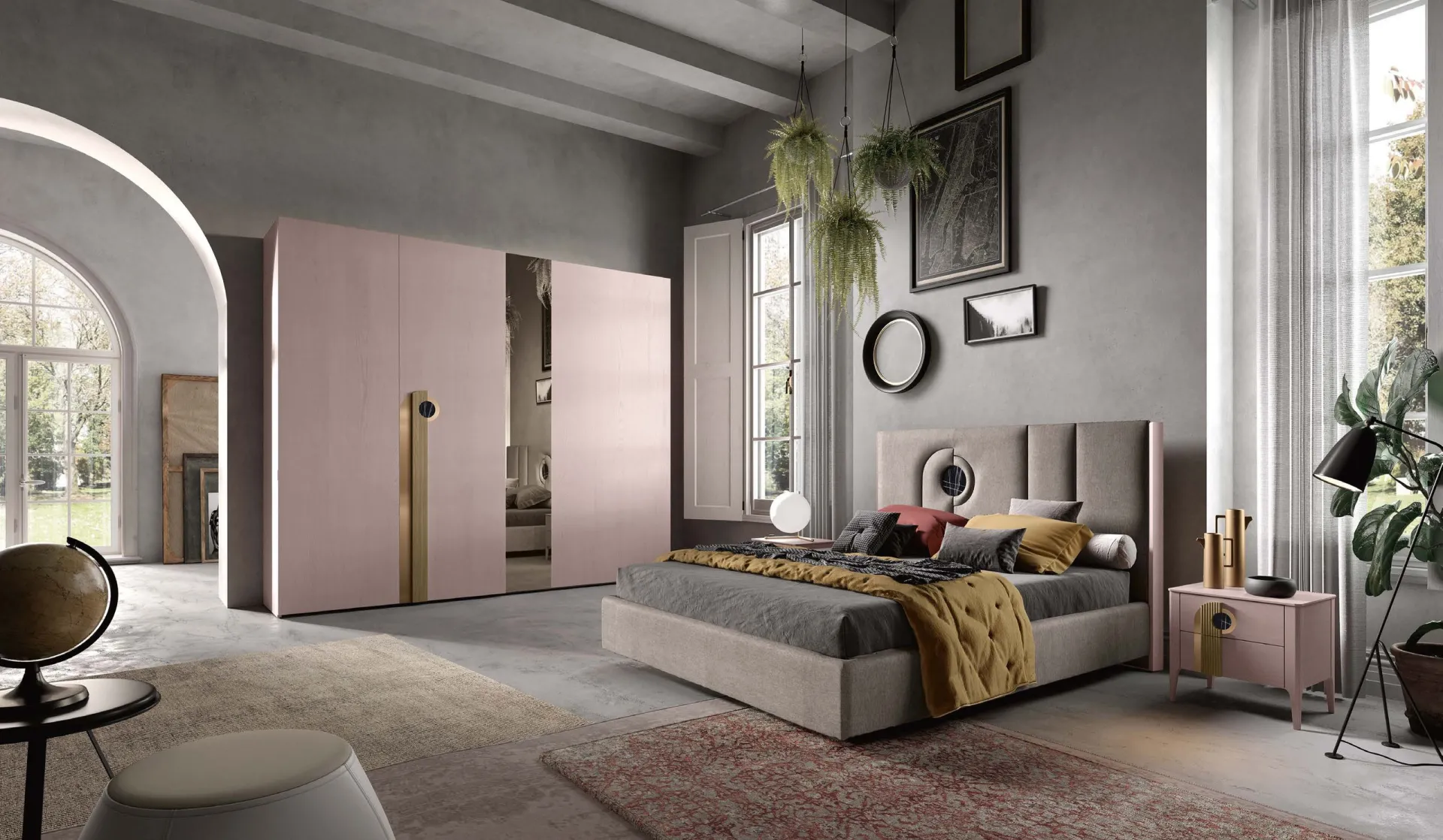 Camera Mood Adriatica con armadio rosa cipria e letto con testiera imbottita