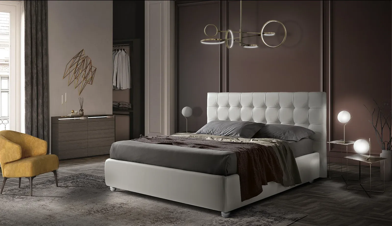 Letto imbottito Eden Artigiana Letti in una camera da letto arredata