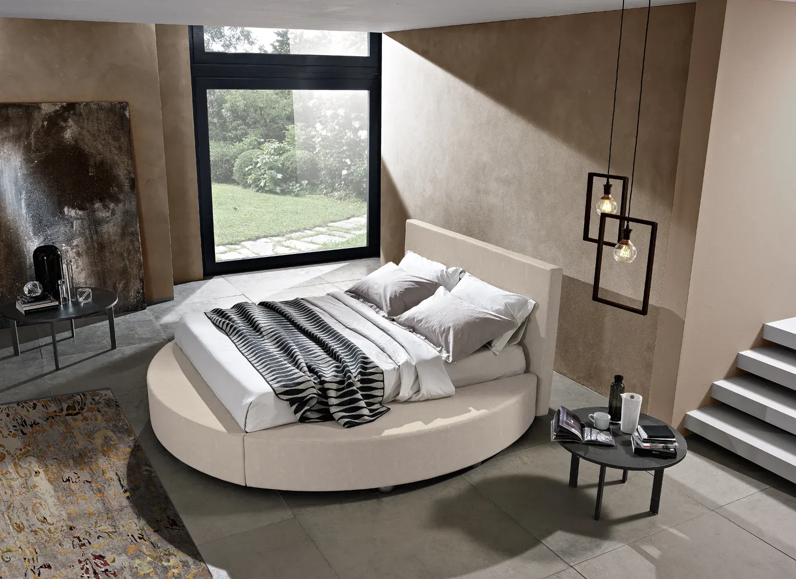 Letto imbottito Tondo Artigiana Letti in una camera da letto arredata
