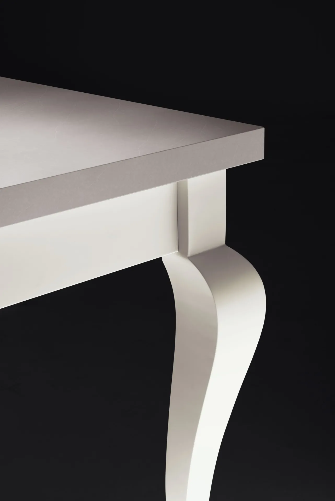 Dettaglio della gamba curva laccata bianca del tavolo Convito Scavolini