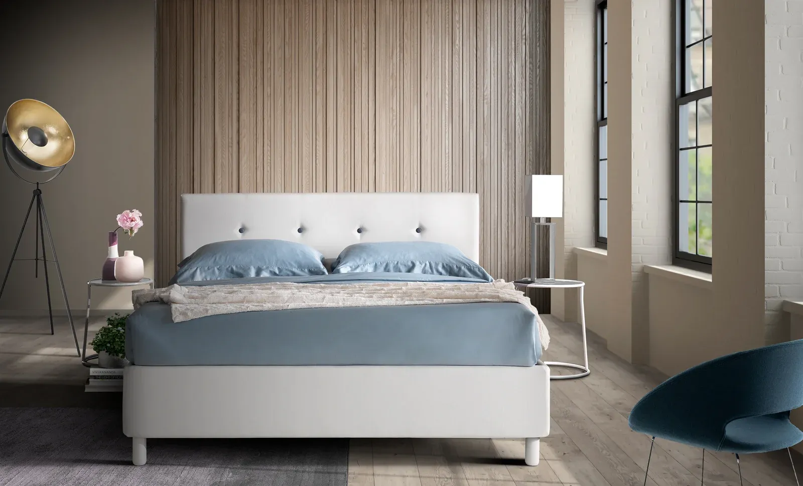 Letto imbottito Ischia Artigiana Letti in una camera da letto arredata