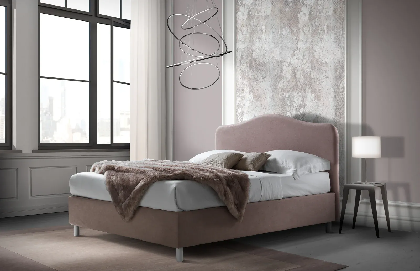 Letto imbottito Lipari Artigiana Letti in una camera da letto arredata