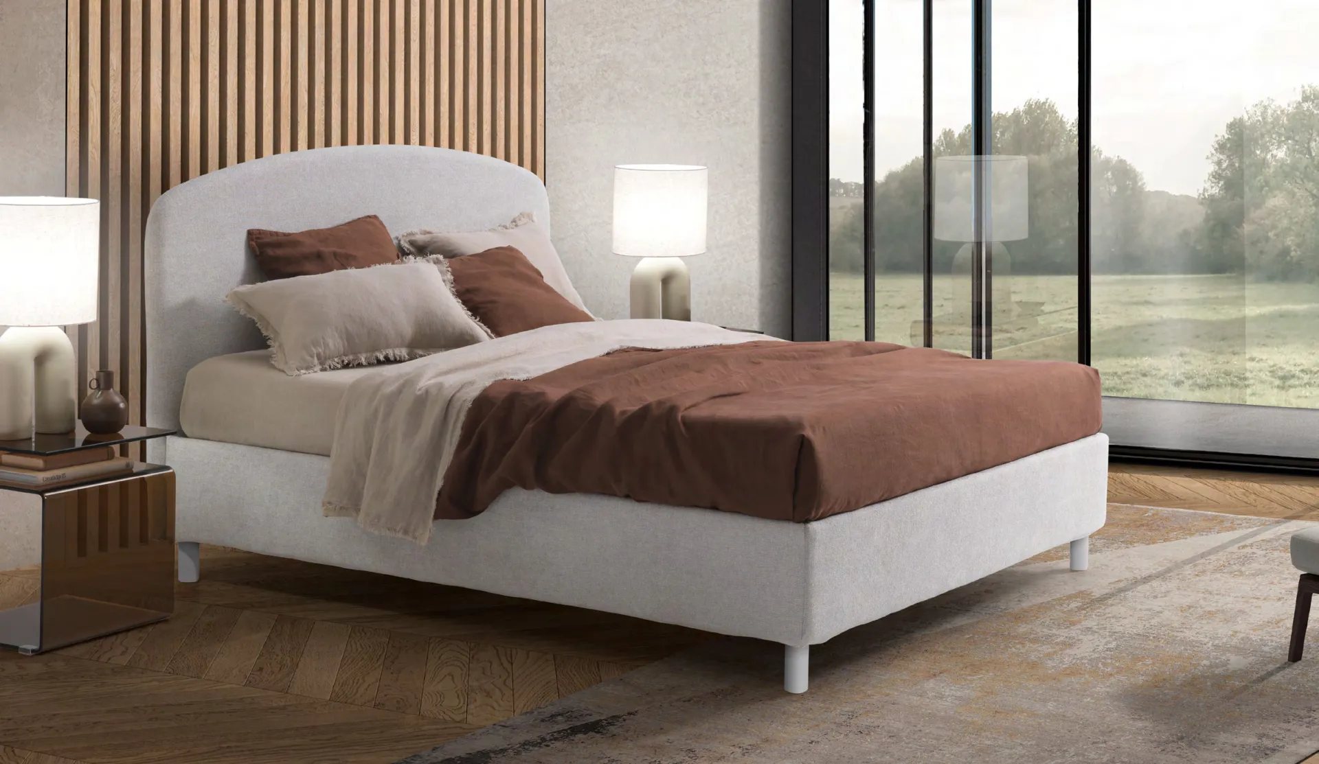 Letto imbottito Capraia Artigiana Letti in una camera da letto arredata