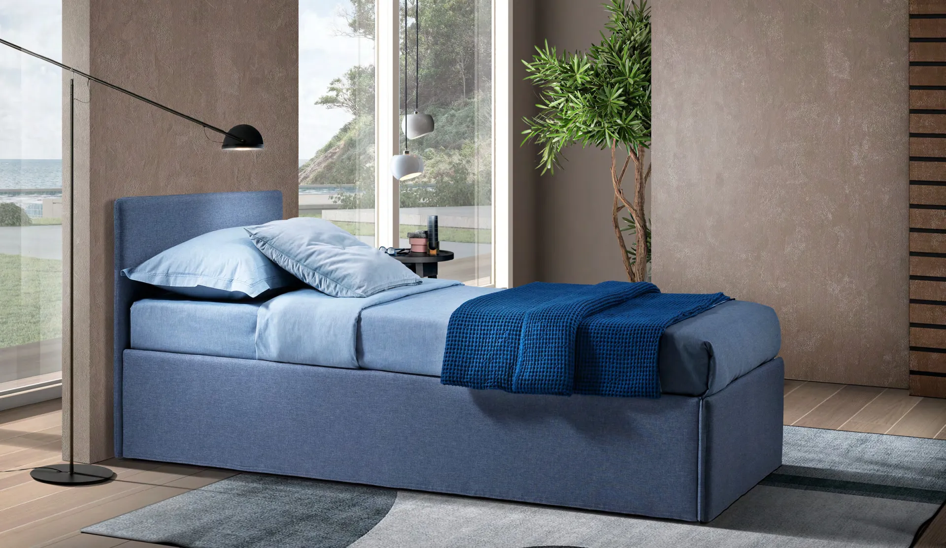 Letto imbottito Palmarola Artigiana Letti in una camera da letto arredata