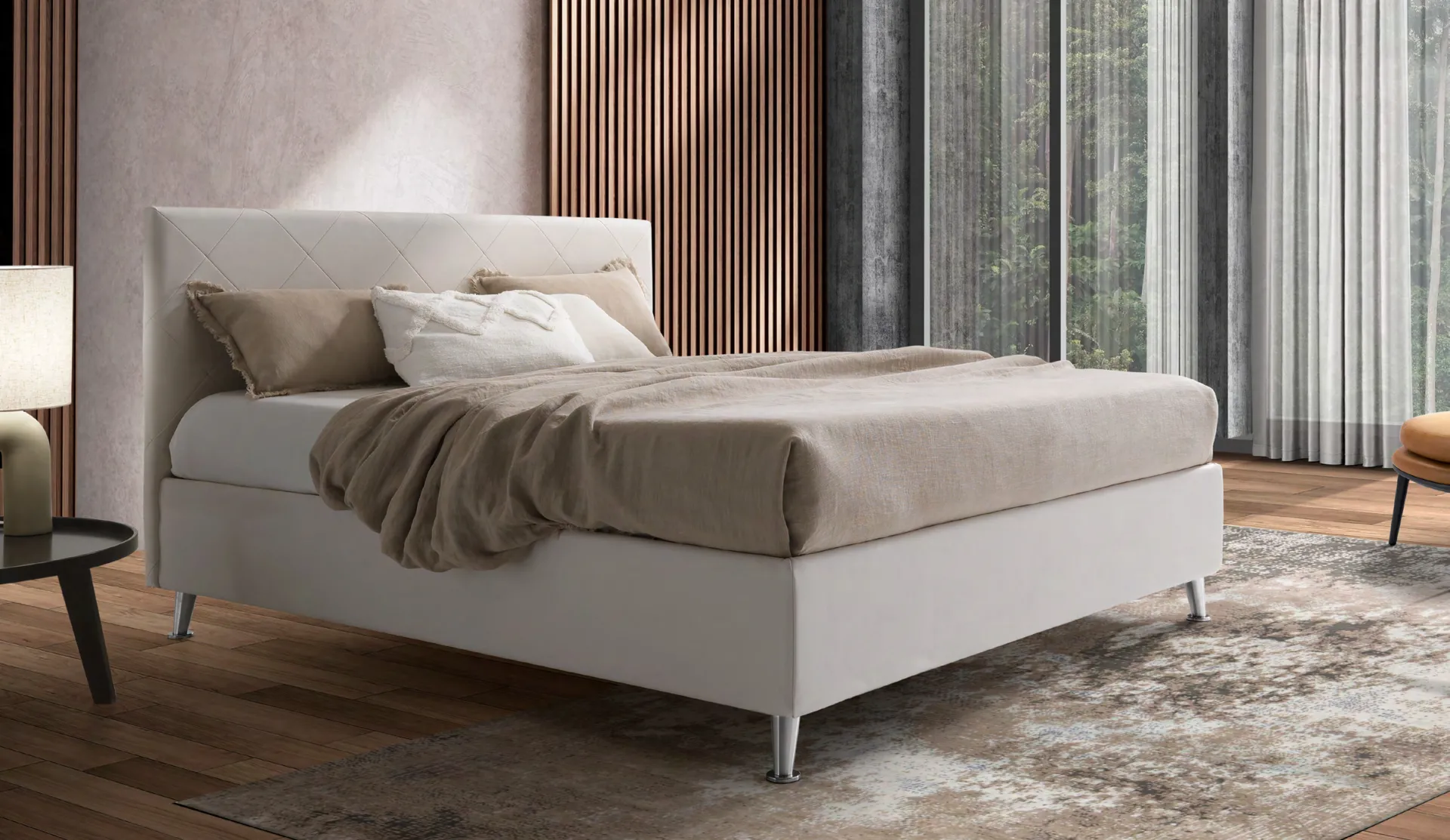 Letto imbottito Panarea Artigiana Letti in una camera da letto arredata