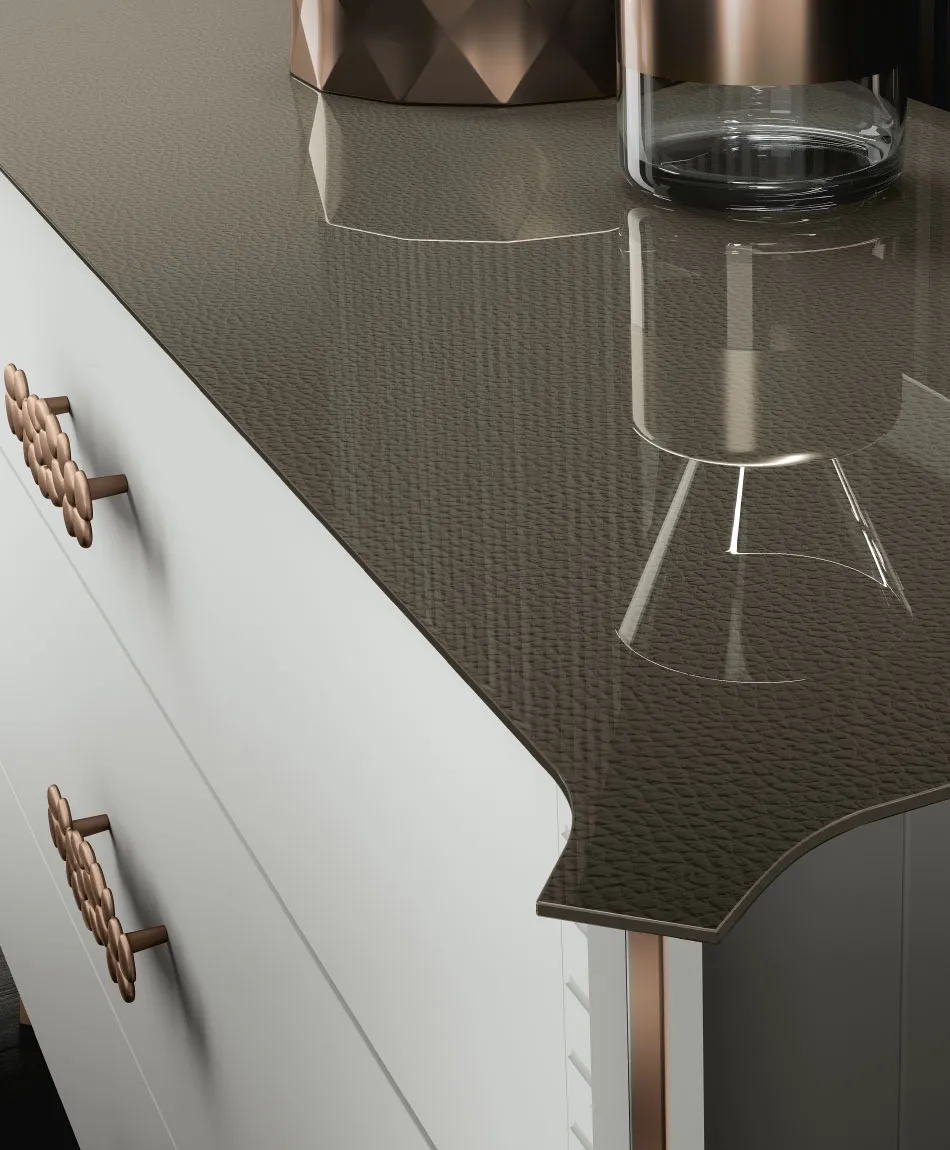 Top in vetro effetto pelle e fianco in rame del comò Gemme 01 Artigianmobili