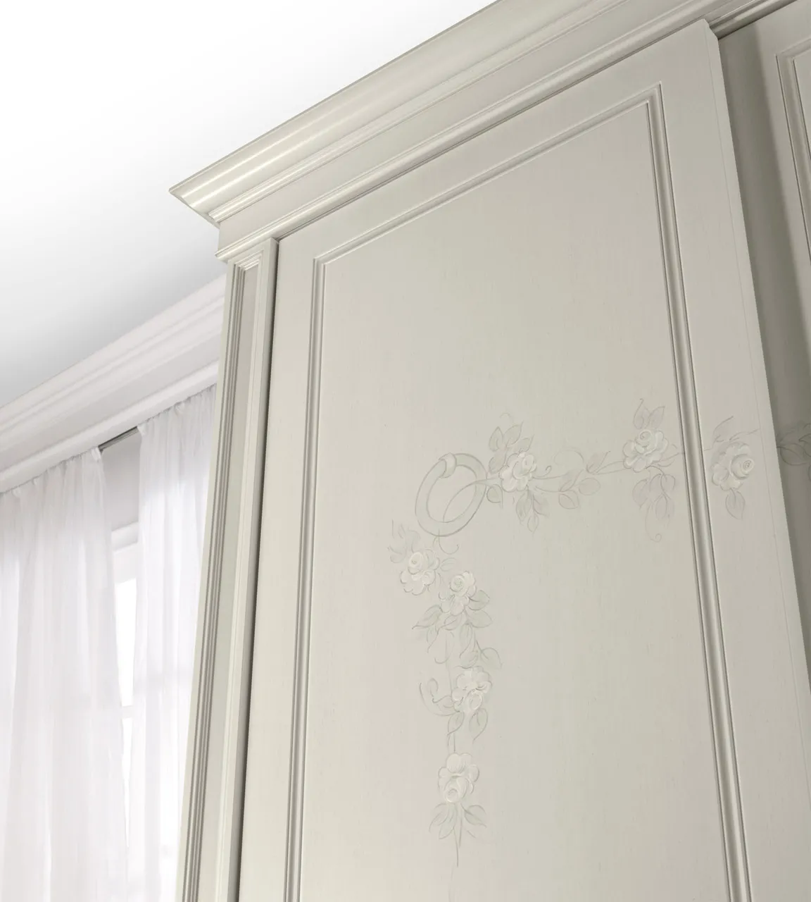 Decoro floreale artico sotto la cornice dell'armadio Demetra Bernazzoli