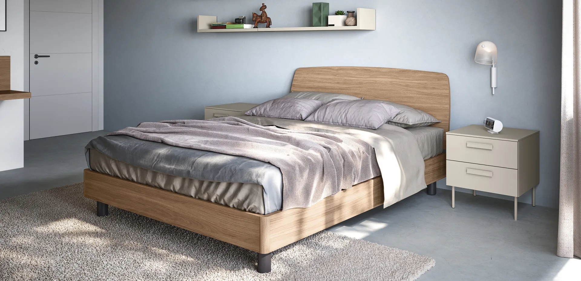 Comodino Praga Cinquanta3 canapa su gambe metalliche accanto a letto in legno